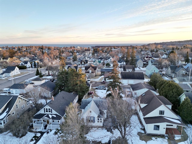 aerial view at dusk with a residential view