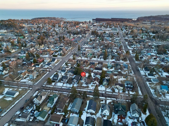 bird's eye view featuring a residential view and a water view