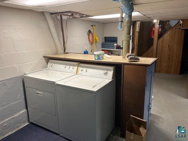 clothes washing area with laundry area and washer and dryer