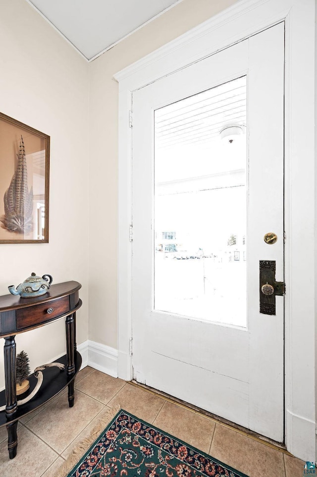 entrance foyer with light tile patterned flooring