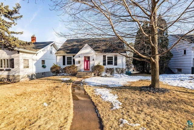 view of new england style home