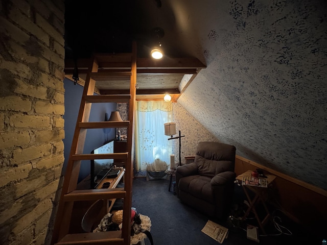 interior space with vaulted ceiling with beams