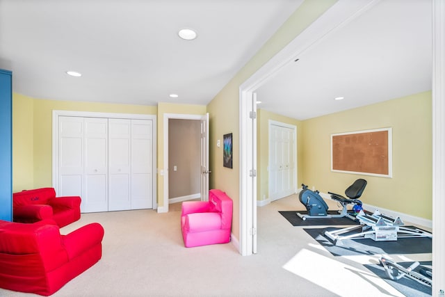 interior space with carpet, baseboards, and recessed lighting