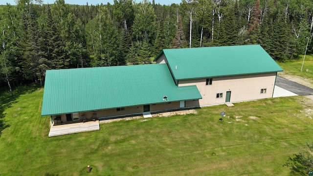 aerial view featuring a view of trees