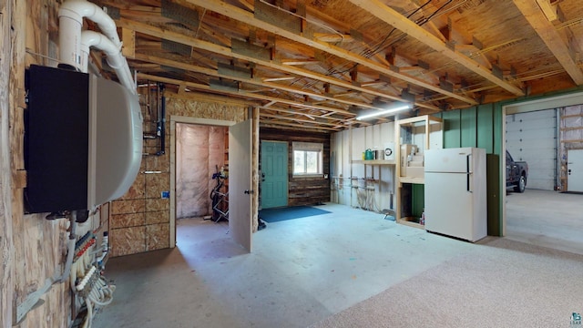 basement with freestanding refrigerator