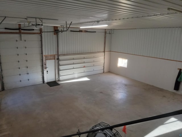 garage featuring metal wall