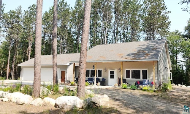 view of front of home featuring an attached garage and driveway