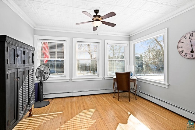 sunroom with a healthy amount of sunlight and a ceiling fan