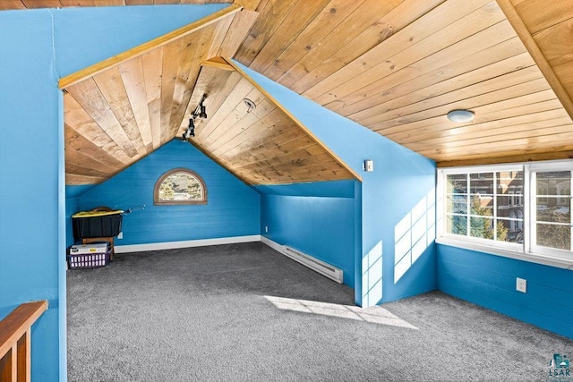 additional living space with vaulted ceiling, baseboard heating, wooden ceiling, and carpet flooring