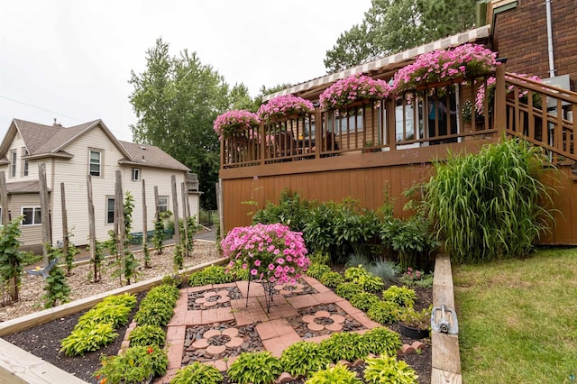 view of yard with a patio area and a garden