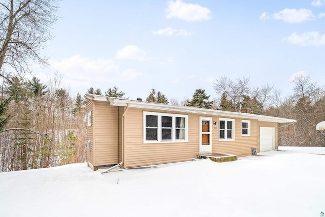 view of front of home with an attached garage