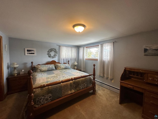 carpeted bedroom featuring baseboard heating