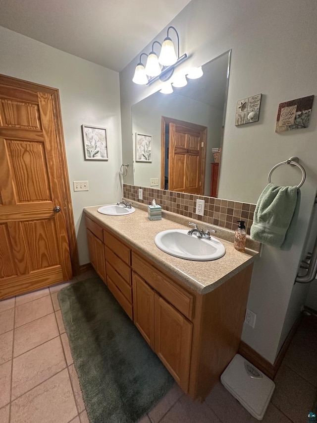 full bath featuring double vanity, backsplash, and a sink