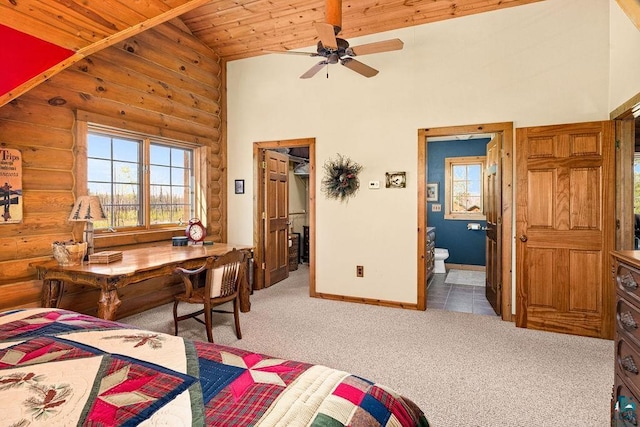 bedroom featuring a spacious closet, high vaulted ceiling, carpet flooring, wooden ceiling, and log walls