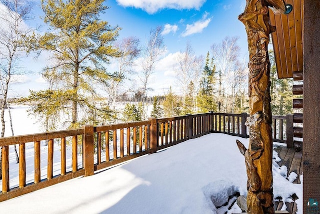 view of snow covered deck