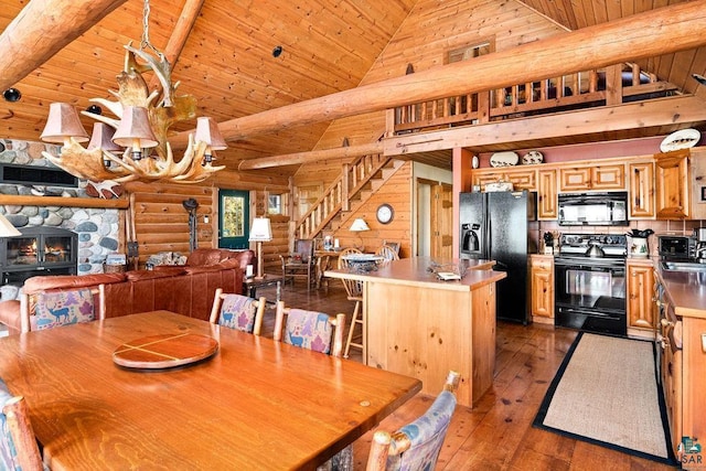 dining room featuring dark wood-style floors, wooden ceiling, a fireplace, log walls, and stairs