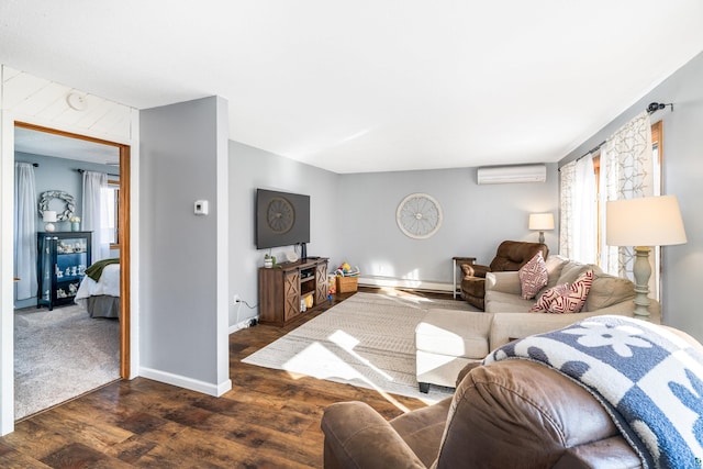 living area featuring baseboards, dark wood-style flooring, and a wall mounted AC