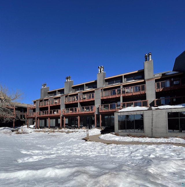 view of snow covered property