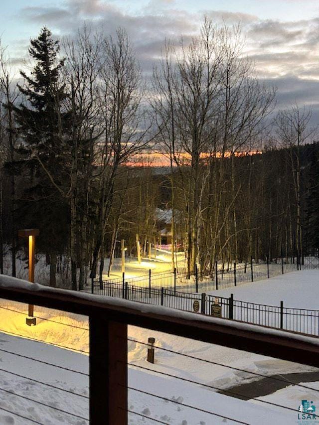 wooden deck featuring fence