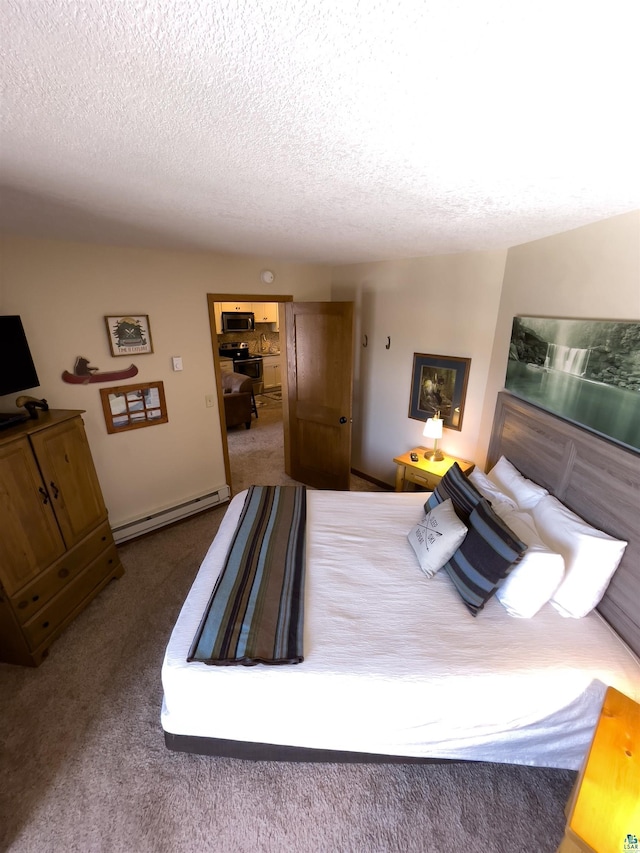 bedroom with a textured ceiling, carpet floors, and a baseboard radiator