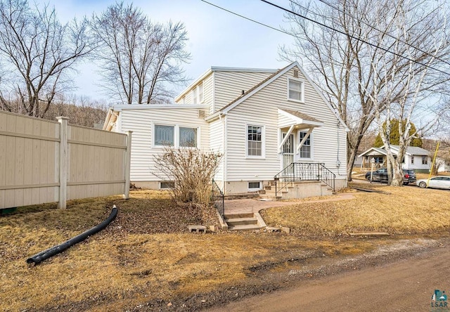 view of front of property with fence