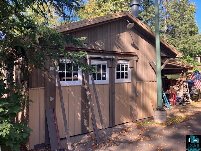 view of outbuilding featuring an outdoor structure