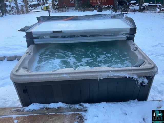 exterior details with a jacuzzi