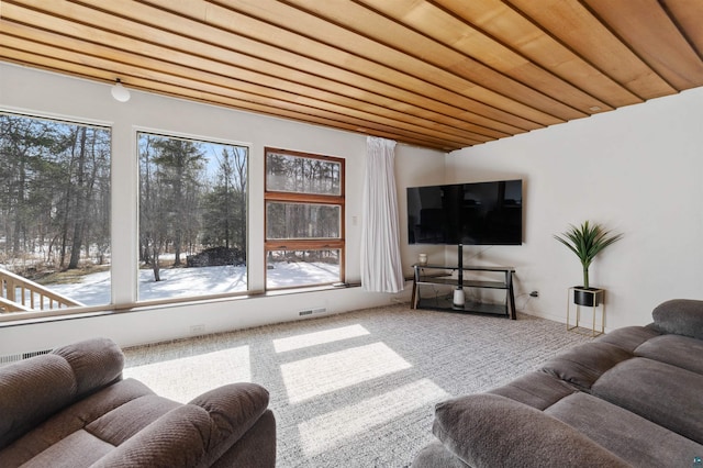 carpeted living area with visible vents