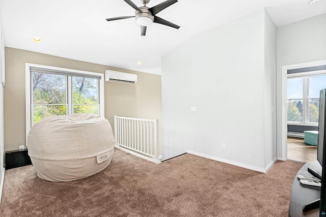 living area featuring plenty of natural light, an AC wall unit, carpet floors, and vaulted ceiling