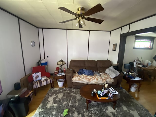 living room with a ceiling fan