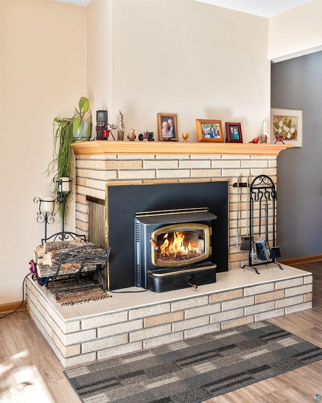 details with baseboards and wood finished floors