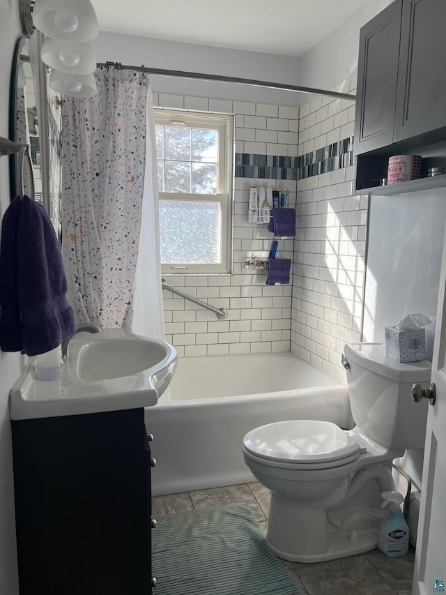 bathroom with vanity, tile patterned floors, shower / tub combo, and toilet