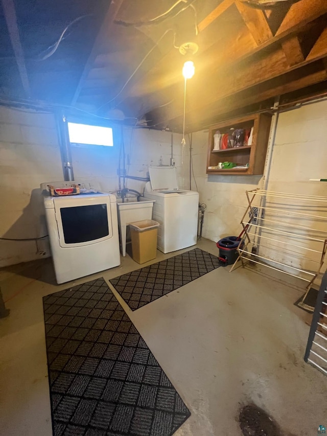 basement featuring washing machine and dryer