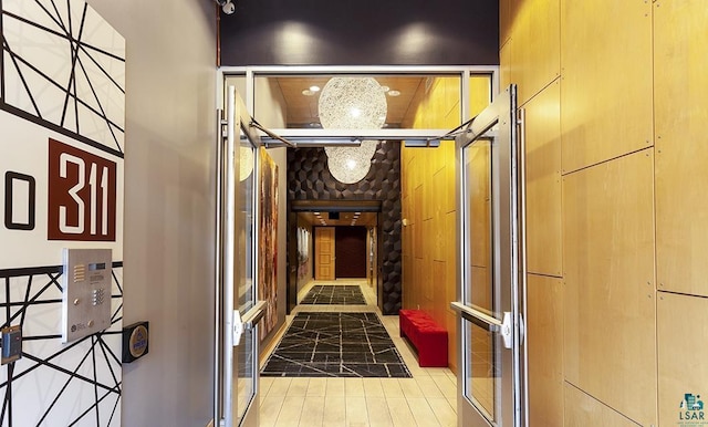 hallway featuring tile patterned flooring