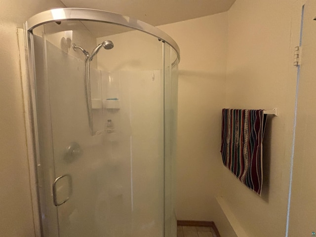 full bathroom featuring a shower stall