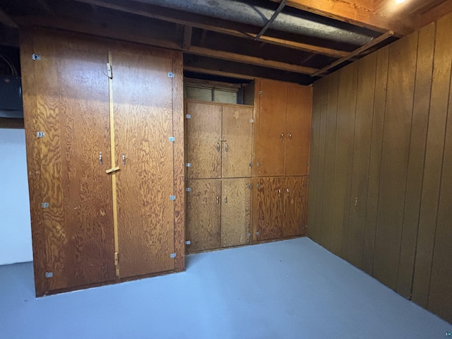 unfinished basement with wooden walls