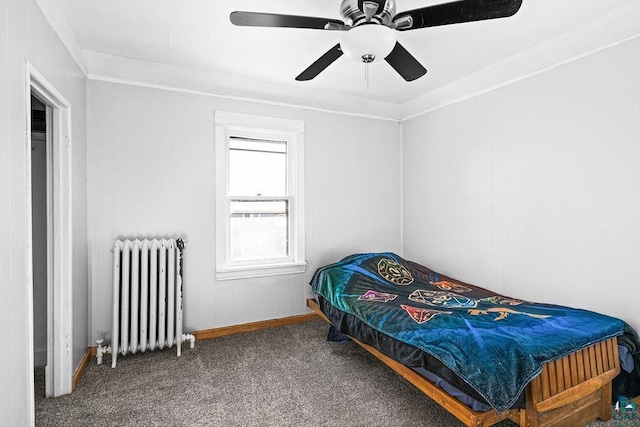 bedroom featuring radiator, a ceiling fan, carpet, and ornamental molding