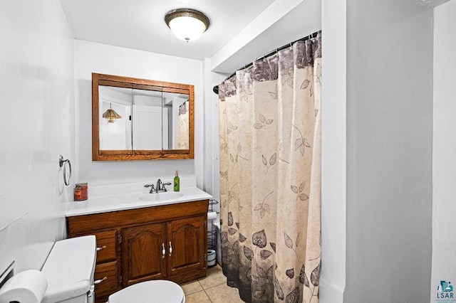 bathroom with tile patterned floors, curtained shower, toilet, and vanity