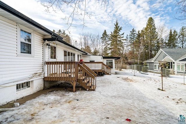 view of yard with a wooden deck and fence