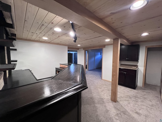 interior space with recessed lighting, light colored carpet, and wood ceiling