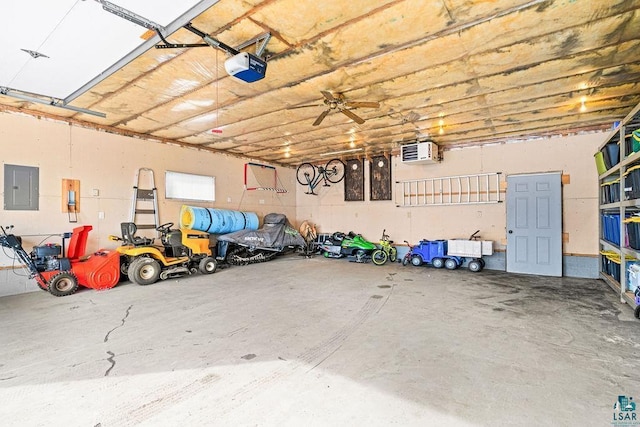 garage featuring electric panel and a garage door opener