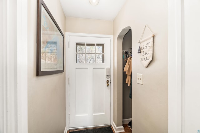 doorway featuring arched walkways