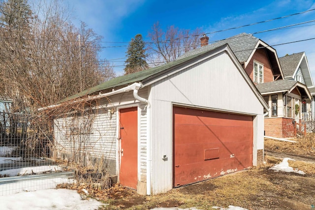 detached garage with fence