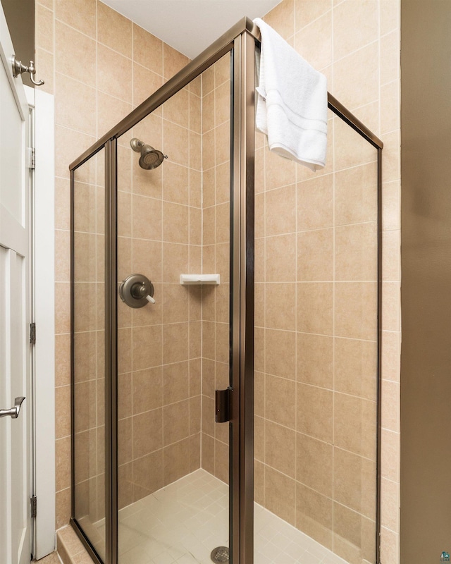 bathroom with a stall shower