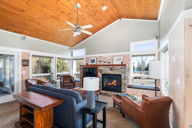 carpeted living area with ceiling fan, wooden ceiling, high vaulted ceiling, and a fireplace