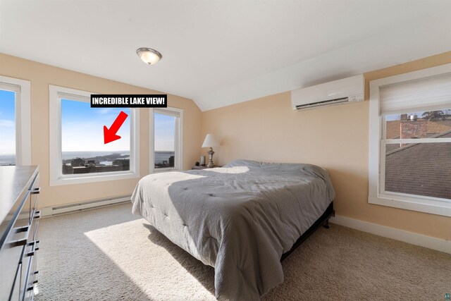 carpeted bedroom with multiple windows, lofted ceiling, a wall unit AC, and a baseboard heating unit