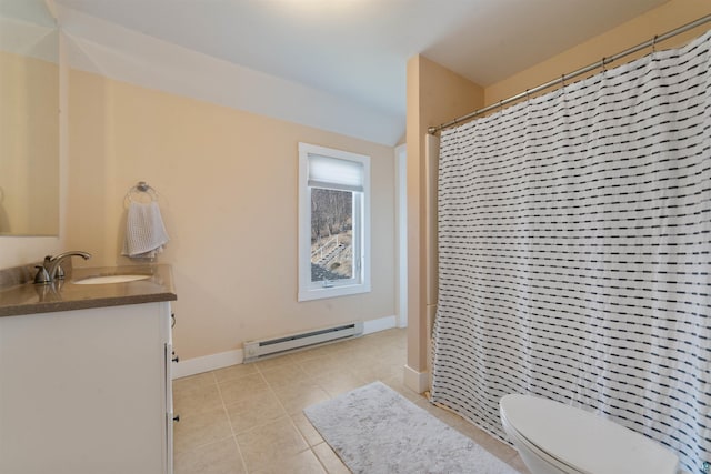 full bathroom featuring tile patterned floors, toilet, vanity, baseboard heating, and baseboards