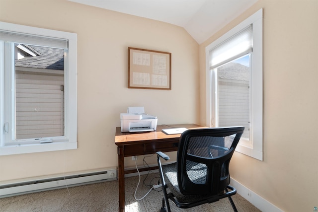 office space featuring baseboards, baseboard heating, and lofted ceiling