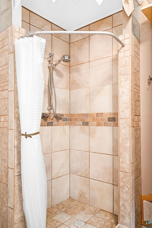 bathroom featuring a shower stall