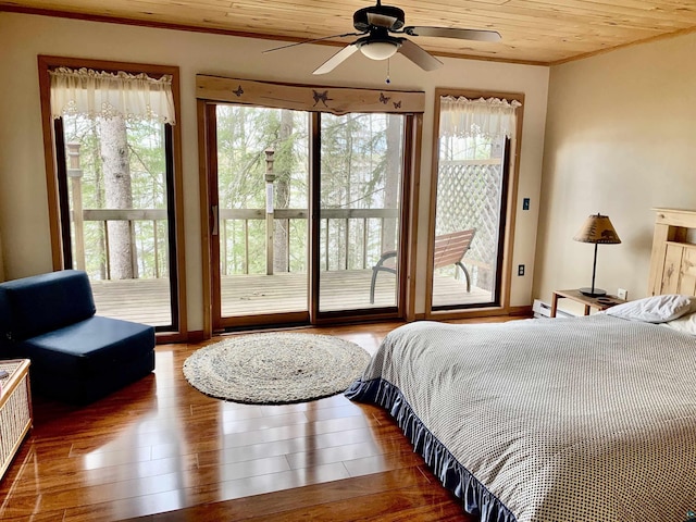bedroom featuring wood ceiling, ornamental molding, access to outside, and wood finished floors
